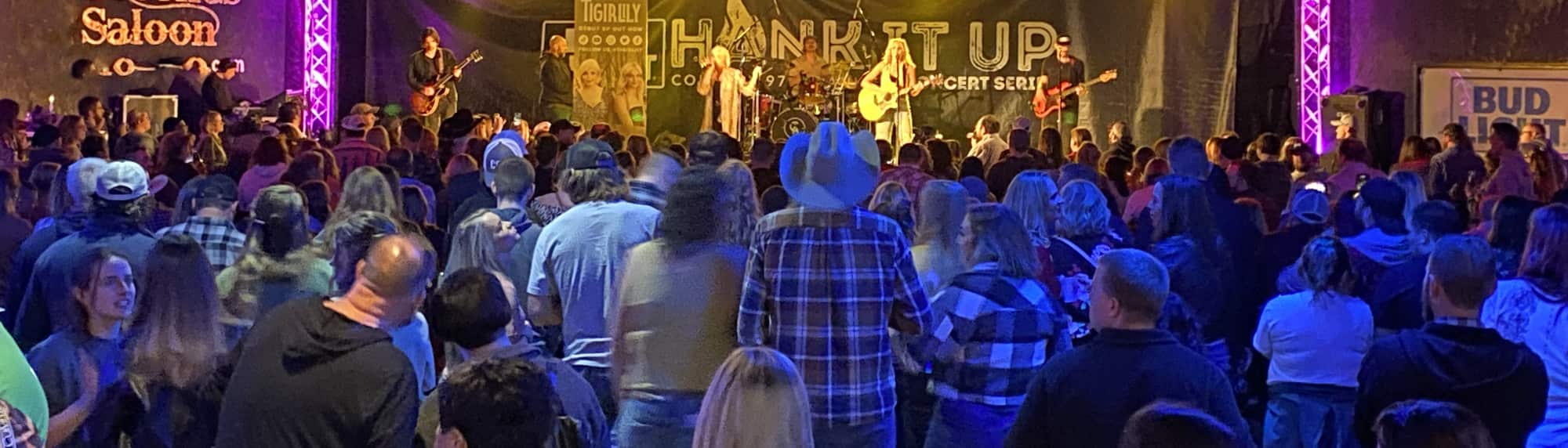country concert with fans wearing cowboy hats Philadelphia